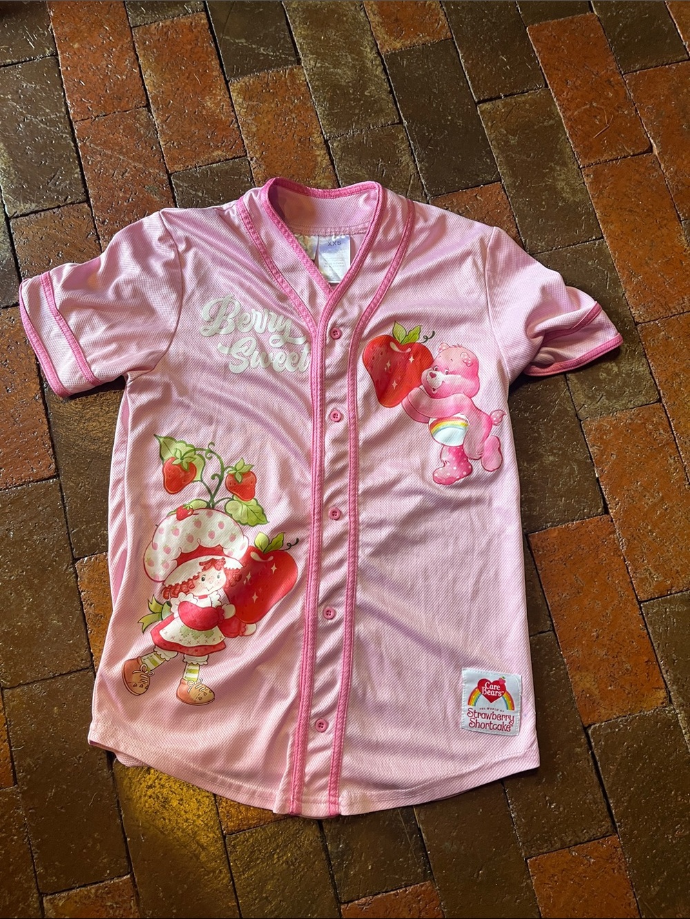 Care Bears Strawberry Shortcake XXS button front jersey pink 2411